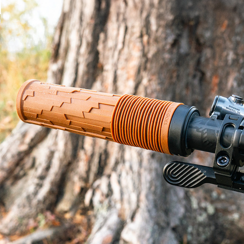 Close-up of grip on handlebar of bike outside