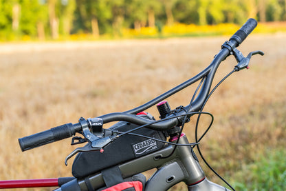 Close-up of a Moonstone handlebar on bike outside against a blurred natural background