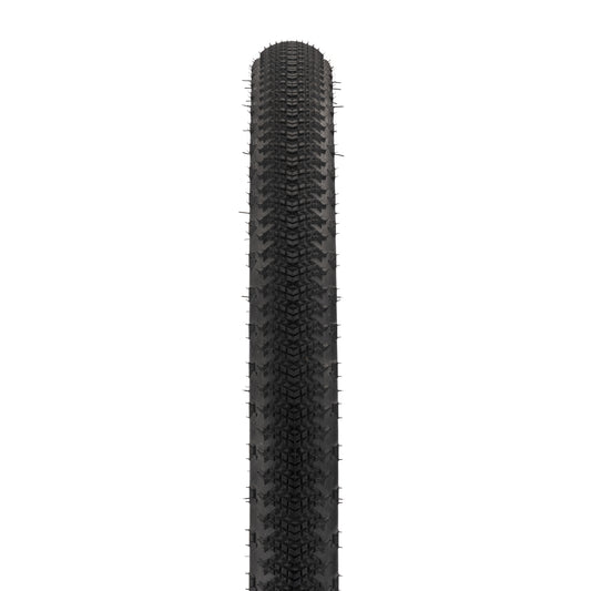 Black tire with tread pattern on a white background