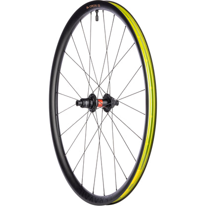 Bicycle wheel with yellow rim and black tire on a white background