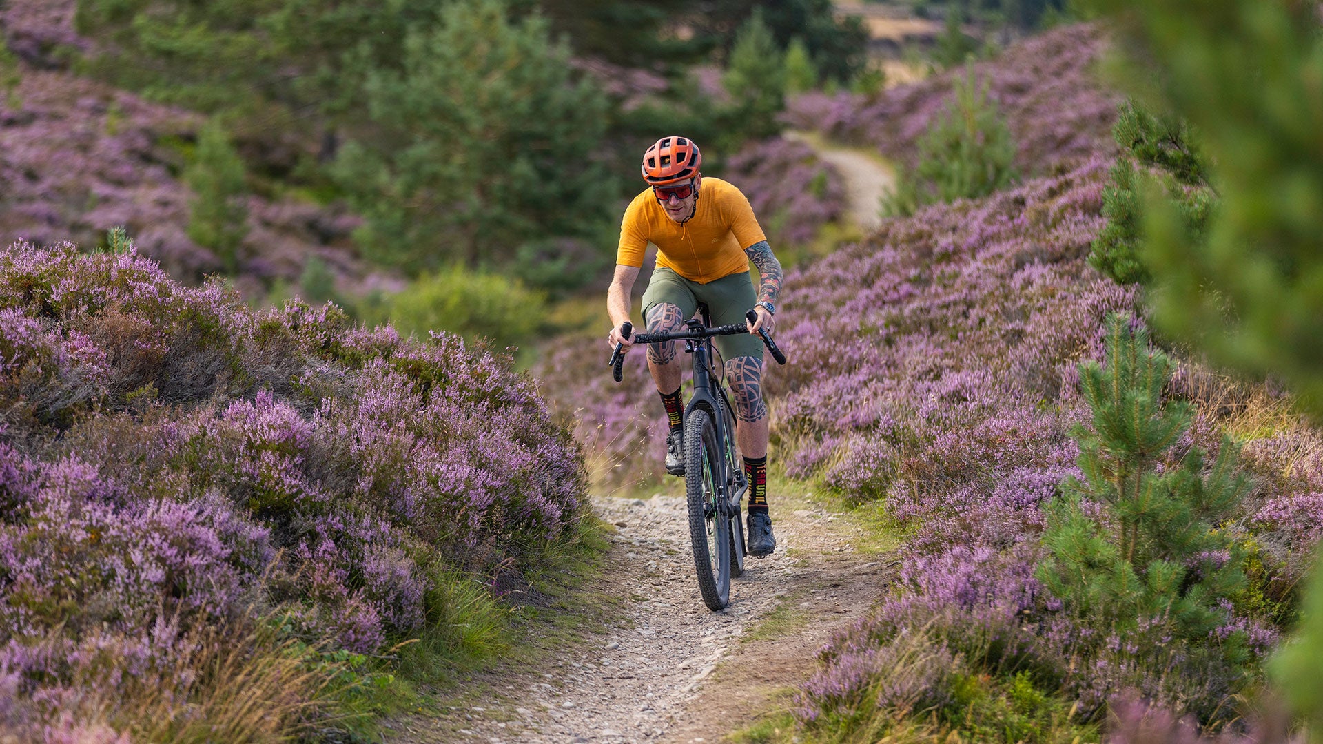 Cyclist riding gravel bike on singletrack