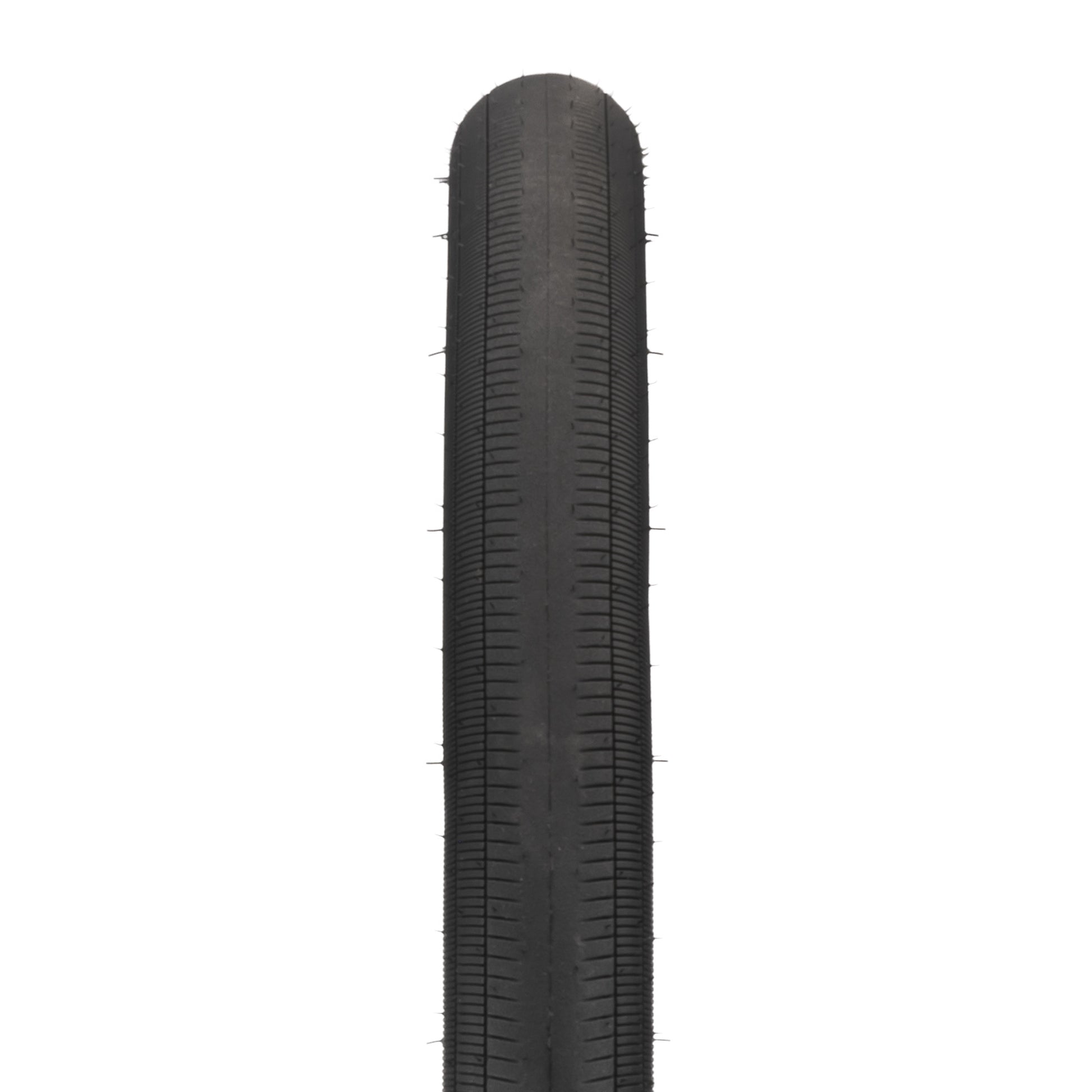 Black tire with tread pattern on a white background