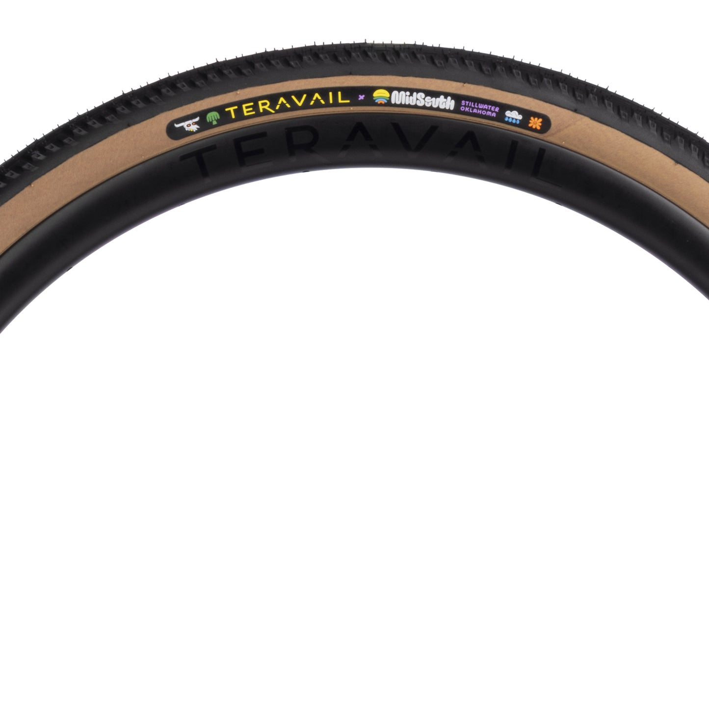 Side view of MidSouth Updraft Tire showing tan sidewall and hotpatch graphics on a white background